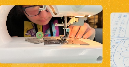 Student sewing in a studio
